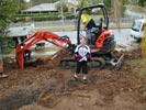 Bobcat digging at Church Rd